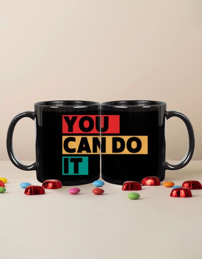 Glossy black ceramic mug with ‘You Can Do It’ text